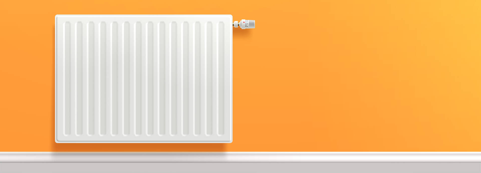 Central heating engineer fitting a radiator